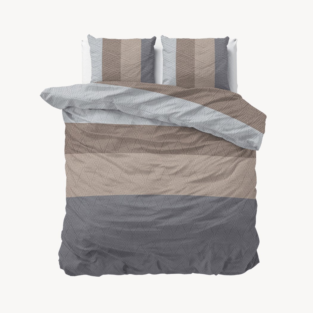 Close-up van het weefsel van de Flanel Knitty Natural Taupe/Grey beddengoedset.
